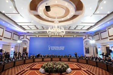 Representatives of the Syria regime and rebel groups along with other attendees take part in the first session of Syria peace talks at Astana's Rixos President Hotel on January 23, 2017. AFP