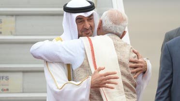 The Crown Prince of Abu Dhabi and Deputy Supreme Commander of UAE Armed Forces General Sheikh Mohammed Bin Zayed Al Nahyan (L) is greeted by Indian Prime Minister Narendra Modi as he arrives at the air force station in New Delhi on January 24, 2016. (AFP)