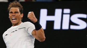 Nadal rolls over Raonic to reach semi-finals