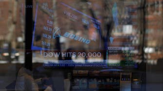 Dow Jones industrial average breaks through 20,000 milestone