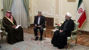 A handout picture provided by the office of Iranian President Hassan Rouhani shows him (R) meeting with Kuwait's Foreign Minister Sabah Al-Khalid Al-Sabah (L) in the capital Tehran, on January 25, 2017. (AFP)