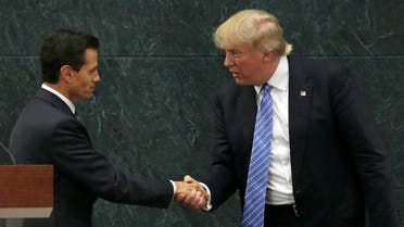 In this Aug. 31, 2016 photo, Mexico's President Enrique Pena Nieto and Republican presidential nominee Donald Trump shake hands after a joint statement at Los Pinos, the presidential official residence, in Mexico City. Trump is calling his surprise visit to Mexico City Wednesday a 'great honor.' The Republican presidential nominee said after meeting with Pena Nieto that the pair had a substantive, direct and constructive exchange of ideas. (AP)