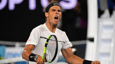Spain's Rafael Nadal reacts after a point against Bulgaria's Grigor Dimitrov during their men's singles semi-final match on day 12 of the Australian Open tennis tournament in Melbourne on January 27, 2017.  SAEED KHAN / AFP