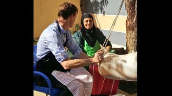 PHOTOS: British ambassador to Egypt makes butter, cheese 
