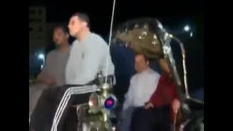 WATCH: Egypt’s Sisi rides on horse carriage with wife around Aswan