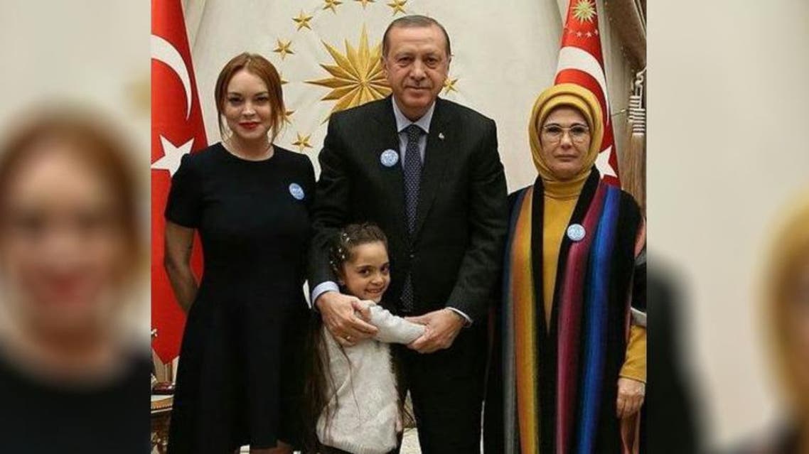In a picture taken at the presidential palace, a smiling Lohan is standing next to Erdogan, who is embracing Bana, and his wife Emine. (Photo courtesy: @AlabedBana)