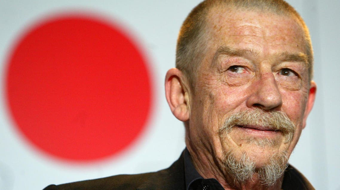 ohn Hurt is seen during a news conference to present "Owning Mahowny" at the 53rd Berlinale international film festival in Berlin February 10, 2003. (Reuters)