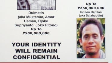 In this handout poster made available 31 May 2006 by the Philippine National Police and the US Department of State's Reward for Justice program, in Manila shows the wanted two Indonesian terror suspects Dulmatin (C) and Umar Patek (lower left) together with Philippines Abu Sayyaf leaders Jainal Antel Sali (uppr L) Khadaffy Janjalani (upper R) and Isnilon Hapilon (lower R). The arrest of 11 Muslim militants in Malaysia has crushed a group known as Darul Islam Sabah which assisted Dulmatin and Patek who are involved in the 2002 Bali bombings, Malaysian police announced 31 May 2006. The group based in eastern Sabah state helped Dulmatin and Patek to travel into southern Philippines from Indonesia between 2003 and last March. Arrested were six Malaysians, three Indonesians and two Filipinos. RESTRICTED TO EDITORIAL USE AFP PHOTO/Philippine National Police/US Department of State/HO