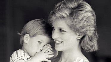 FILE PHOTO - Britain's Princess Diana holds Prince Harry during a morning picture session at Marivent Palace, where the Prince and Princess of Wales are holidaying as guests of King Juan Carlos and Queen Sofia, in Mallorca, Spain August 9, 1988. REUTERS/Hugh Peralta/File Photo
