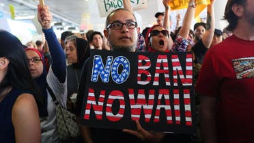 Demonstrators yell slogans during protest against the travel ban imposed by U.S. President Donald Trump's executive order, at Los Angeles International Airport in Los Angeles reuters
