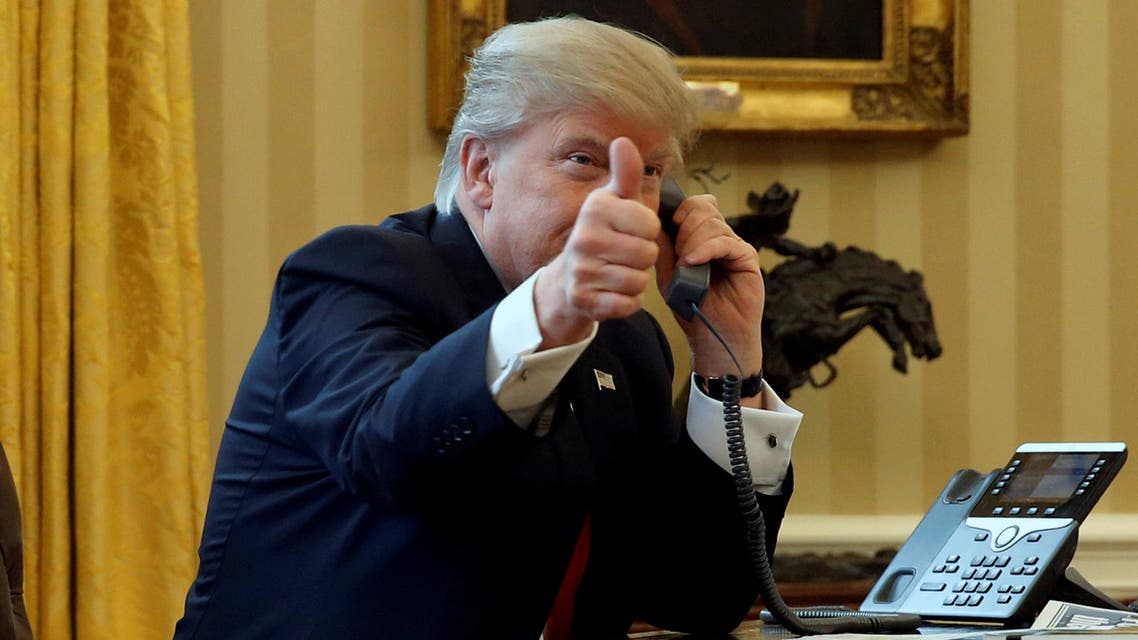 U.S. President Donald Trump gives a thumbs-up to reporters as he waits to speak by phone with Saudi Arabia's King Salman in the Oval Office at the White House in Washington, U.S. January 29, 2017.U.S. President Donald Trump gives a thumbs-up to reporters as he waits to speak by phone with Saudi Arabia's King Salman in the Oval Office at the White House in Washington, U.S. January 29, 2017. (Reuters)