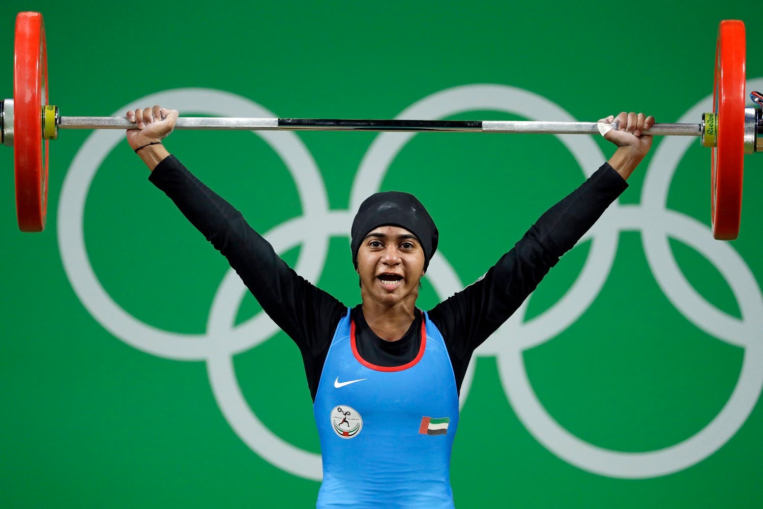 Ayesha Shahriyar M. Albalooshi, of the United Arab Emirates, competes in the women's 58kg weightlifting competition at the 2016 Summer Olympics in Rio de Janeiro. (AP)