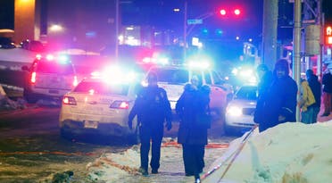  An ambulance is parked at the scene of a fatal shooting at the Quebec Islamic Cultural Centre in Quebec City. (Reuters)