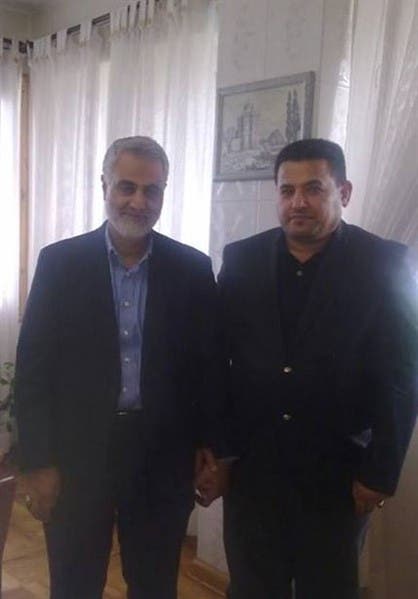 قاسم الأعرجي ويده بيد قاسم سليماني قائد فيلق القدس الإيراني
