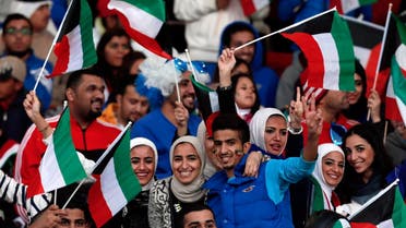 Fans of Kuwait cheer on their team during their Gulf Cup Tournament soccer match against Saudi Arabia at Isa Sports City in Isa Town January 12, 2013. REUTERS