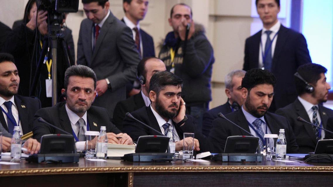 Mohammad Alloush (C), the head of the Syrian opposition delegation, attends Syria peace talks in Astana, Kazakhstan January 23, 2017. REUTERS