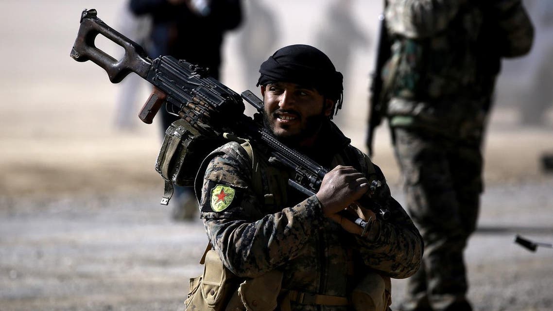 Fighters from the Syrian Democratic Forces gather near a village north-east of Raqa on February 3, 2017, during their advance on the militants’ de facto capital in Syria. (AFP)