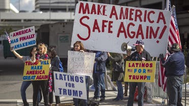 LOS ANGELES, CA - FEBRUARY 04: Trump supporters demonstrate against a ruling by a federal judge in Seattle that grants a nationwide temporary restraining order against the presidential order to ban travel to the United States from seven Muslim-majority countries, at Tom Bradley International Terminal at Los Angeles 