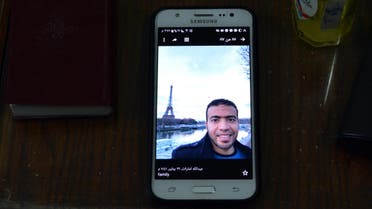 A picture taken on February 5, 2017, shows a picture of Abdallah El-Hamahmy, an Egyptian suspected of being the machete attacker in Paris's Louvre museum, displayed on a mobile phone belonging to his father at the family home in the Nile delta city of Mansura, some 120 kms north of Cairo. A picture taken on February 5, 2017, shows a picture of Abdallah El-Hamahmy, an Egyptian suspected of being the machete attacker in Paris's Louvre museum, displayed on a mobile phone belonging to his father at the family home in the Nile delta city of Mansura, some 120 kms north of Cairo. (AFP)