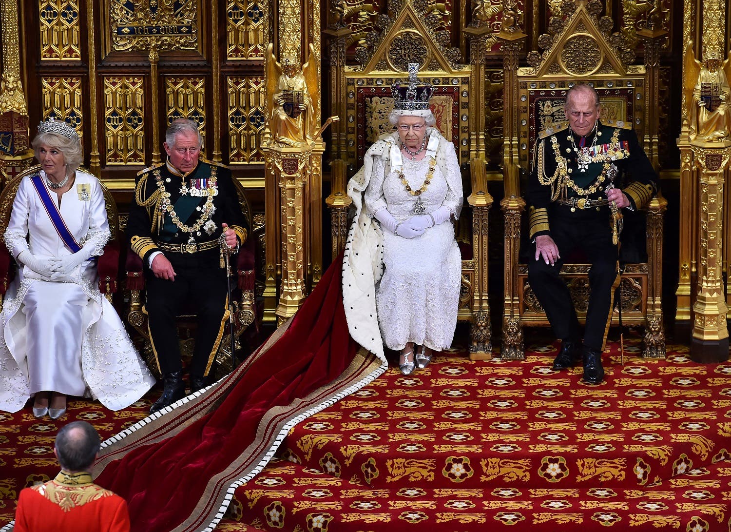Britain's Queen Elizabeth II, 2nd right, seated on the throne in the House of Lords next to her husband, Prince Philip, Duke of Edinburgh, right, son, Prince Charles, Prince of Wales, 2nd left and his wife Camilla, Duchess of Cornwall at the State Opening of Parliament (Photo: Ben Stansall/Pool Photo via AP)
