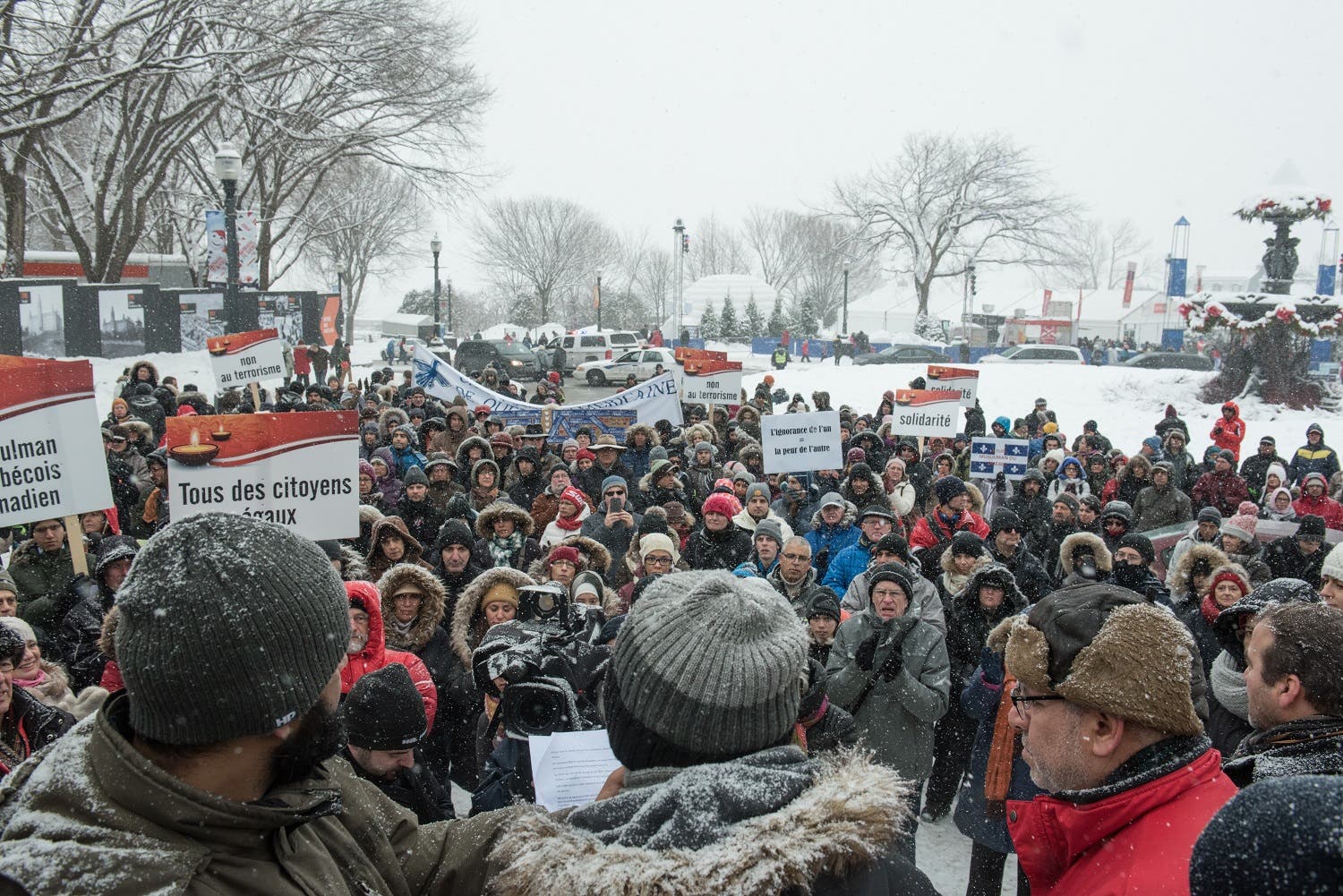 Several hundred people march in solidarity for the victims of the mosque shooting in Quebec City, on February 5, 2017. (AFP)