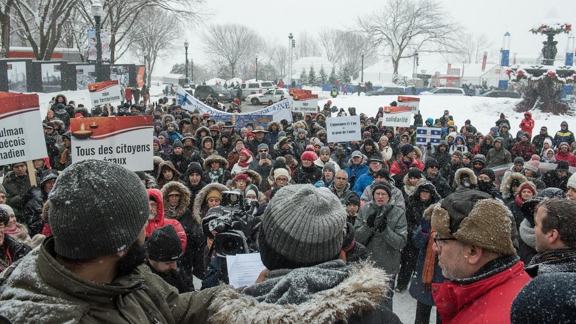 Several hundred people march in solidarity for the victims of the mosque shooting in Quebec City, on February 5, 2017. (AFP)