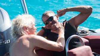 Pictures of Obama on a luxury island spread online