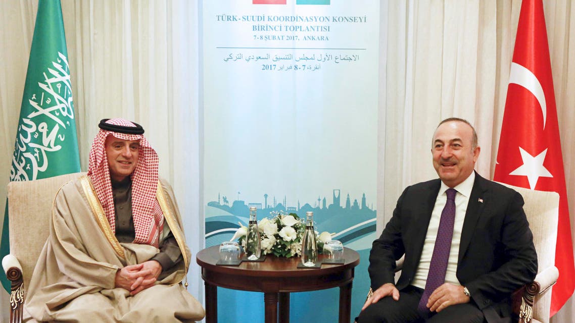 Turkish Foreign Minister Mevlut Cavusoglu (R) and Foreign Minister of Saudi Arabia Adel Al Jubeir (L) react during a meeting in Ankara, on February 8, 2017. AFP