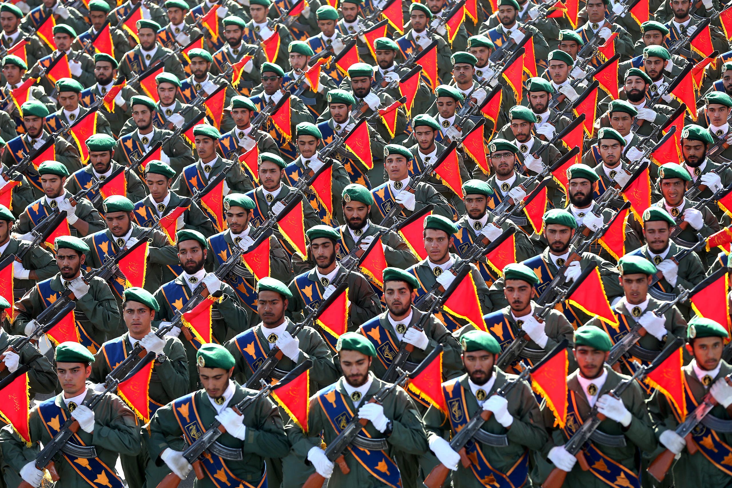 Iran's Revolutionary Guard troops march in a military parade marking the 36th anniversary of Iraq's 1980 invasion of Iran, in front of the shrine of late revolutionary founder Ayatollah Khomeini, just outside Tehran, Iran, Wednesday, Sept. 21, 2016. (AP)