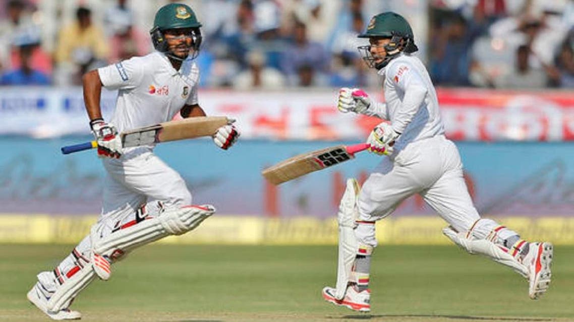 Bangladesh’s captain Mushfiqur Rahim (right), and Mehedi Hasan run between the wickets during the third day of the cricket test match against India in Hyderabad, India, on Saturday, Feb. 11, 2017. (AP)