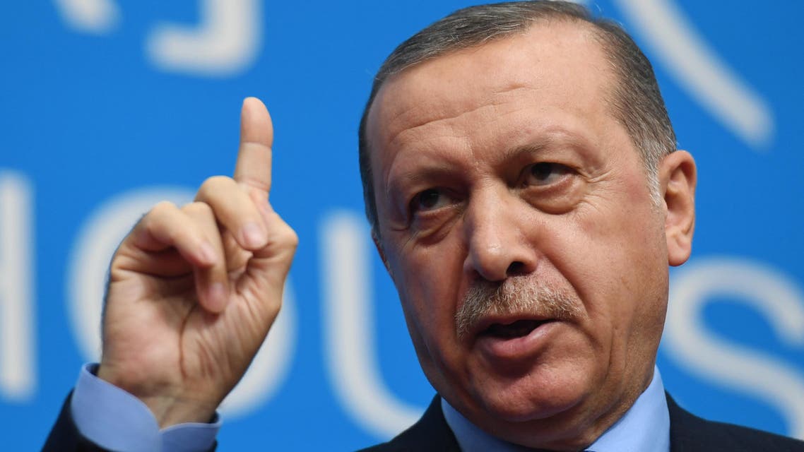 (FILES) This file photo taken on September 05, 2016 shows Turkey's President Recep Tayyip Erdogan gesturing during a press conference after the closing of the G20 Leaders Summit in Hangzhou. Turkey's election board officially confirmed on February 11, 2017 that a referendum on constitutional changes that would expand President Recep Tayyip Erdogan's powers will take place on April 16. The government says the far-reaching changes are needed for more effective leadership, but opponents fear they will drag Turkey into one-man rule. Erdogan is seen by critics as increasingly autocratic after 14 years in power as both prime minister and president. AFP