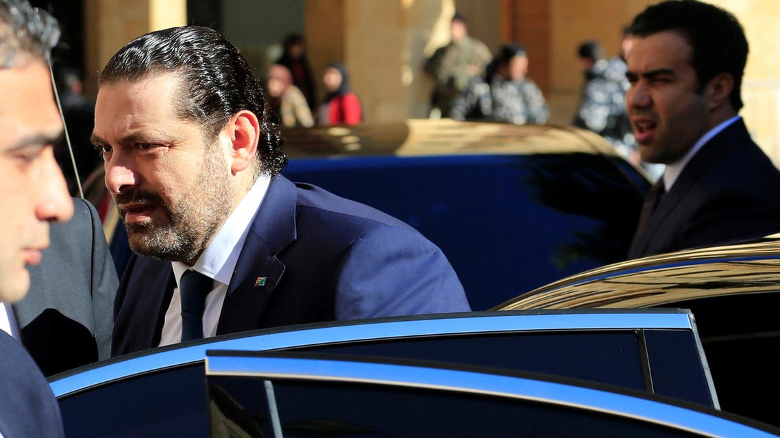 Lebanon's Prime Minister Saad al-Hariri (C), gets out of a vehicle outside the Parliament building before his new government won a vote of confidence in parliament in downtown Beirut, Lebanon December 28, 2016. REUTERS/Jamal Saidi