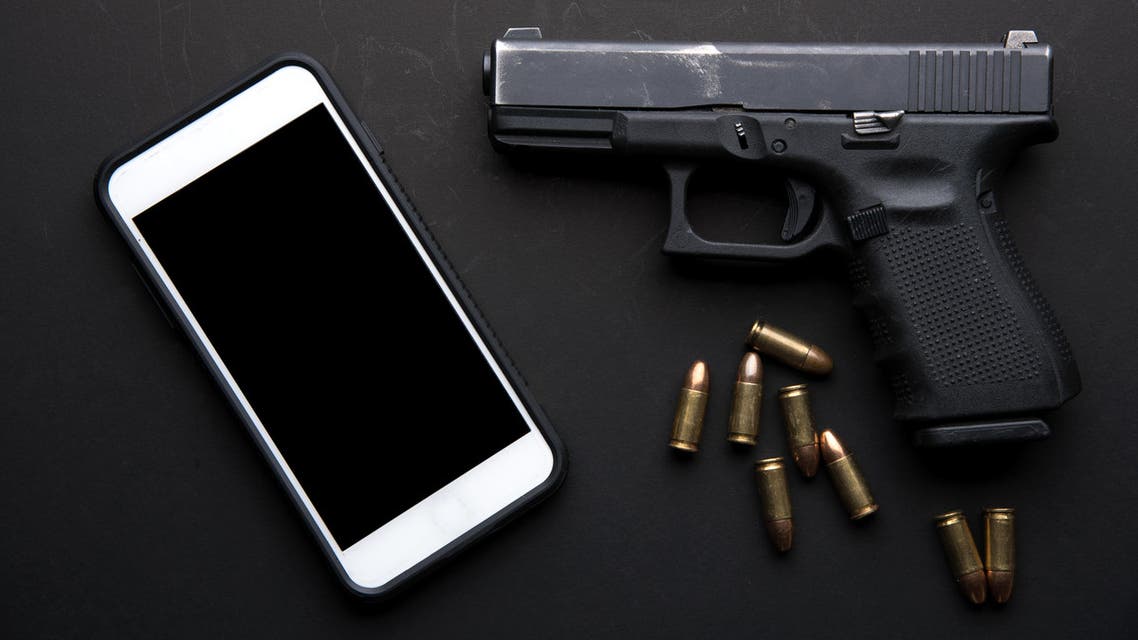 shutterstock gun phone