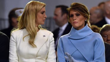 US First Lady Melania Trump speaks with Ivanka Trump during the presidential inaugural parade for US President Donald Trump on January 20, 2017 in Washington, DC