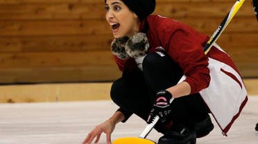 Qatar’s Hanan Al Boinin shouts instructions to her teammates during a round-robin Curling game against Japan at the Asian Winter Games in Sapporo, northern island of Hokkaido, Saturday, Feb. 18, 2017. (AP)
