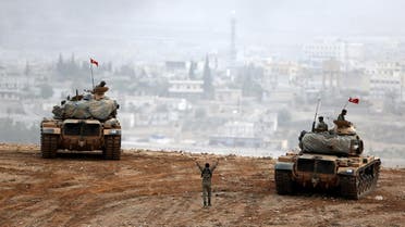Turkish army tanks take position on top of a hill near Mursitpinar border crossing. (File photo: Reuters)