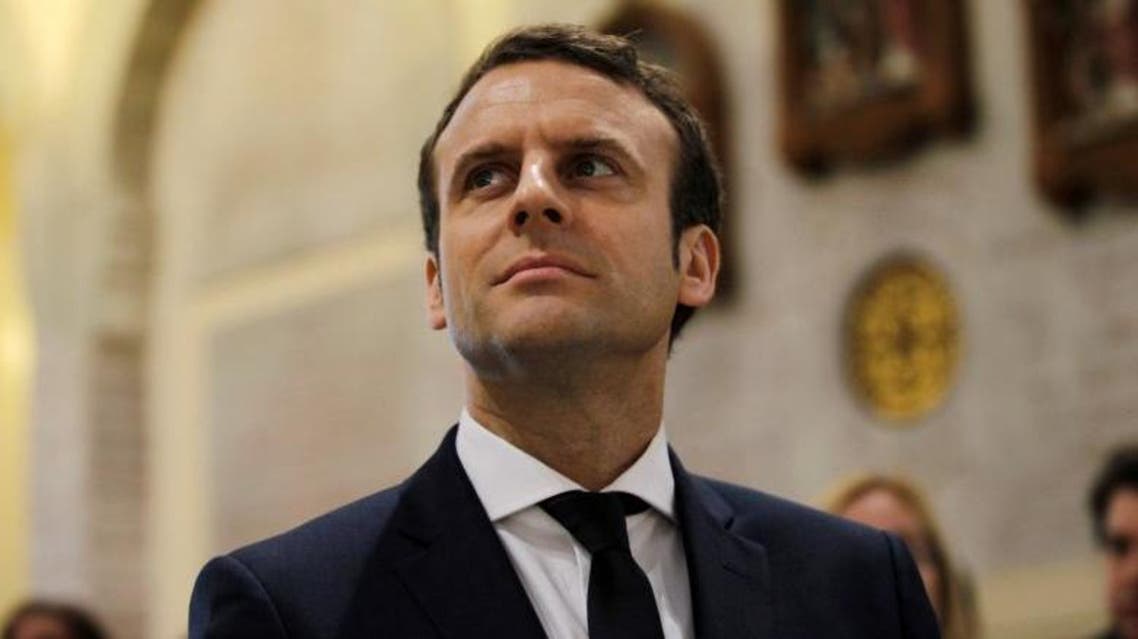 Emmanuel Macron, head of the political movement En Marche!, or Onwards!, and candidate for the 2017 French presidential elections visits the Basilique Notre Dame d'Afrique in Algiers, Algeria February 14, 2017. (Reuters)
