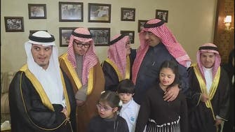 Saudi Crown Prince talks football with young boy at Down Syndrome center visit