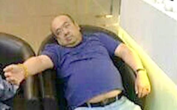 The picture released by the New Straits Times reportedly shows Kim Jong-Nam slumped in a chair in Kuala Lumpur International Airport. (Photo courtesy: NST)