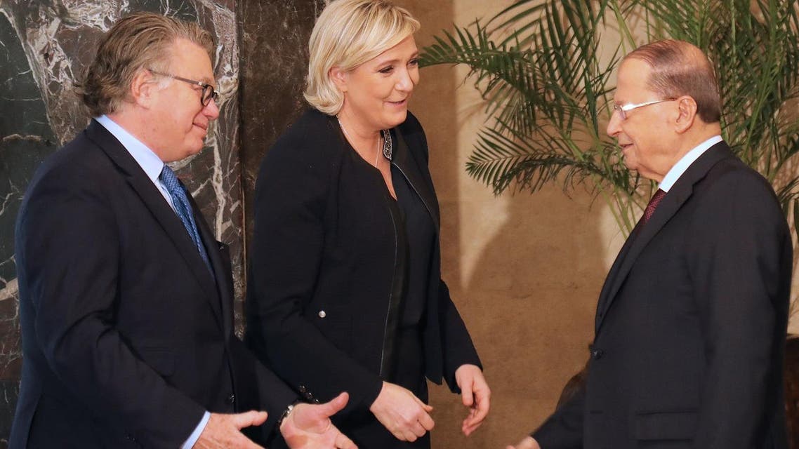 Marine Le Pen and French MP Gilbert Collard greet with Lebanese President Michel Aoun (R) at the Presidential palace of Baabda, on February 20, 2017. (AFP)