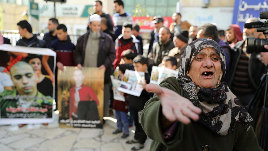 A Palestinian woman reacts during a protest following the sentencing of Israeli soldier Elor Azaria, in the West Bank City of Hebron February 21, 2017. reuters