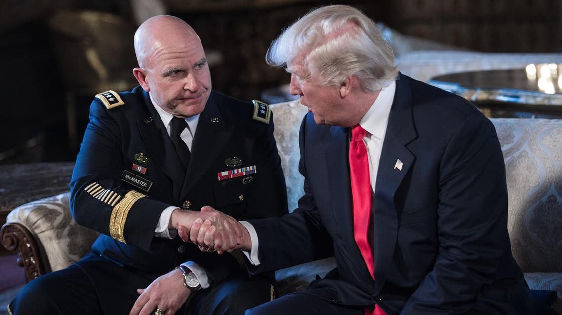 US President Donald Trump shakes hands with US Army Lieutenant General H.R. McMaster (L) as his national security adviser at his Mar-a-Lago resort in Palm Beach, Florida. (AFP)