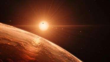 Artist’s impression released by the European Southern Observatory on February 22, 2017, shows the view just above the surface of one of the planets in the TRAPPIST-1 system. (AFP)