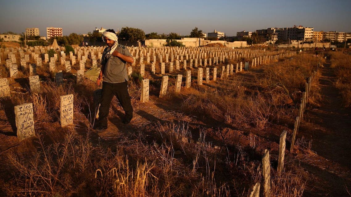 The bodies of some 130 fighters shot execution-style or beheaded by rival extremists have been found in mass graves in northwestern Syria, a monitoring group and rebel sources said Thursday. The grim discovery comes nearly a week after clashes in Idlib province between the extremist Jund al-Aqsa rebel group and Al-Qaeda’s former Syrian affiliate and allied factions. At least 131 bodies were found on Wednesday and Thursday in two separate mass graves near the town of Khan Sheikun, said the Syrian Observatory for Human Rights. Some had been shot and others beheaded. Last week the bodies of 41 rebel fighters had been found near the same town, said the Britain-based monitoring group. Observatory director Rami Abdel Rahman said Jund al-Aqsa had detained the fighters and then “executed” them. Mohammad Rashid, a spokesman for the rebel Jaish al-Nasr group, also reported the deaths but put the number of bodies found at 128. According to him, 71 of those killed were fighters from his group. “Three citizen journalists and 11 commanders were among them,” said Rashid. A source from the civil defence also reported that 128 bodies had been recovered from two graves inside a former army barracks that had been occupied by Jund al-Aqsa. Jund al-Aqsa, which is considered close to ISIS, is reviled by most rebels in the region and is designated a “terrorist group” by Washington. Earlier this month, Jund al-Aqsa had been locked in clashes with Fateh al-Sham, the former Al-Qaeda affiliate in Syria, after tensions over influence in Idlib, a province held by rebels. Fateh al-Sham was fighting alongside several allied groups in a coalition dubbed Tahrir al-Sham, and the battles spread beyond Idlib to neighboring Hama province. According to the Observatory, Jund al-Aqsa fighters have pulled back to Hama and to other areas. More than 310,000 people have been killed in Syria since the conflict began in March 2011 with anti-government protests. The war has become a complex multi-front conflict, drawing in extremist groups and international armies. (AFP)