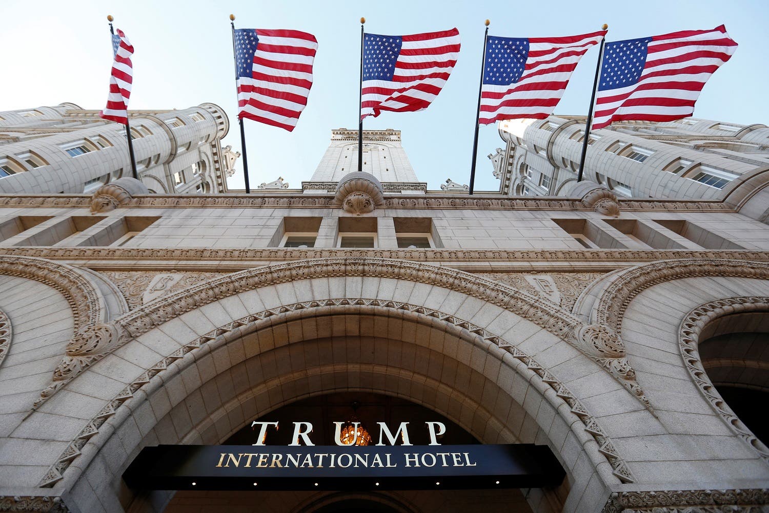 Flags fly above the entrance to Trump International Hotel in Washington, DC. (File photo: Reuters)