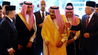 Saudi Arabia’s King Salman leaves after inspecting an honor guard with Malaysia’s Prime Minister Najib Razak (right) and Malaysia’s King Muhammad V (left) at the Parliament House in Kuala Lumpur, on February 26, 2017. (Reuters)
