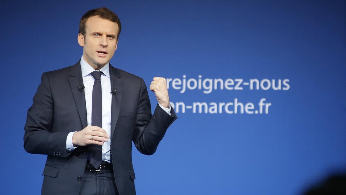 French presidential election candidate for the "En Marche" movement Emmanuel Macron delivers a speech during a meeting in Saint-Priest-Taurion, central France, on February 25, 2017. PASCAL LACHENAUD / AFP