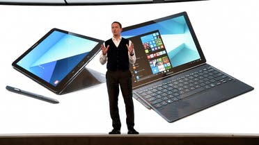 Chief Marketing Officer of Samsung Electronics Europe, David Lowes, presents the tablet Samsung Galaxy Book during a press conference on February 26, 2017 (Photo: Lluis Gene/AFP)