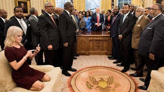 Trump aide Conway causes social media storm for kneeling on White House sofa