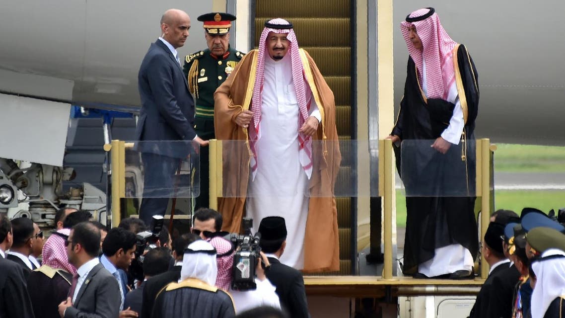 King Salman bin Abdul Aziz smiles as he arrives at Halim airport in Jakarta on March 1, 2017. (AFP)